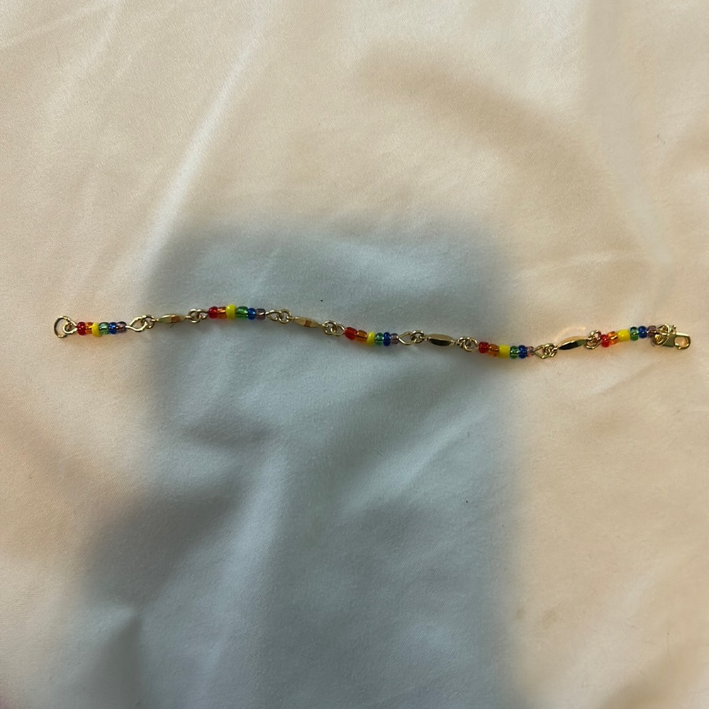 Rainbow and gold bracelet from a cruise
